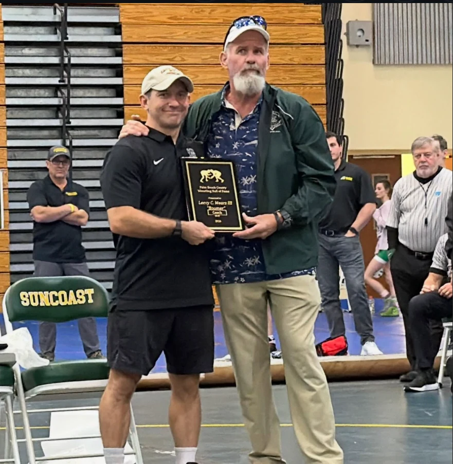 Coach Mears receiving his 2026 Palm Beach County Wrestling Hall of Fame plaque